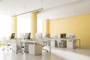 Fototapeta na wymiar Spacious yellow office centre, columns, side view