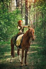 Fantasy medieval woman hunting in forest