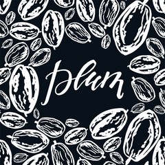 Dried plums pattern on black background