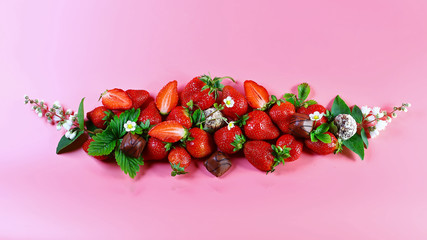 composition of sweet raw Strawberries with chocolate, isolated on a pink background. Flat lay. Copy space