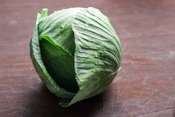 Cabbage on Dark Wood