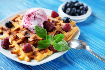 Belgian waffles with fresh berries and ice cream 