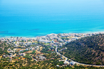 Fototapeta na wymiar Greece, Crete. Panoramic view from the mountains on the coast of the Mediterranean Sea.