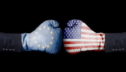 Boxing gloves with European Union and USA flag. European Union versus USA concept. © yurchello108