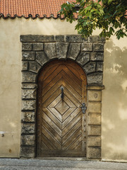 Beautiful wooden doors on the evrope streets. Sun day