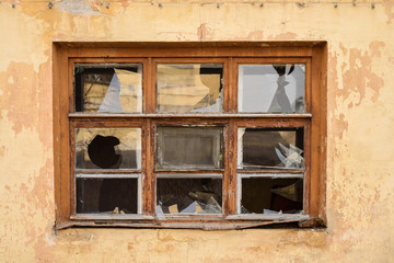 Old window with broken Windows