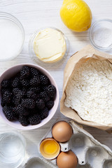 Raw ingredients for cooking blackberry pie. Overhead, top view.