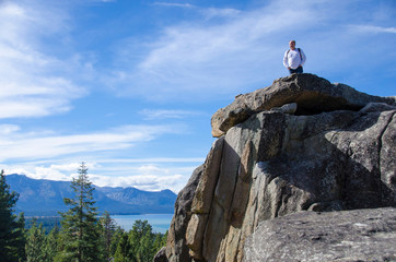 Man Hiking on Top of Rocks in Lake Tahoe