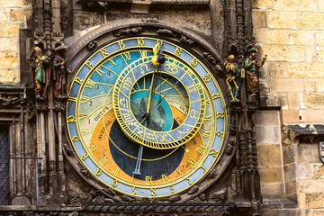 Fototapeta na wymiar Prague chimes at sunset. The medieval clock tower