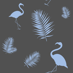 Vector illustration of a silhouette of a blue flamingo with palm leafs