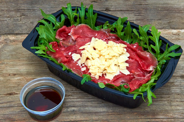 Healthy food delivery, lunch box with salad to take away