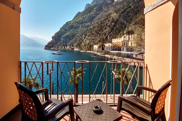 Naklejka premium View of the beautiful Lake Garda .Riva del Garda town and Garda lake in the summer time , Italy