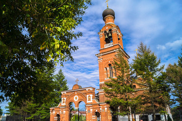 Entrance into the territory and the campanile of the Savior Transfiguration Church in Tushino....