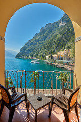 View of the beautiful Lake Garda .Riva del Garda town and Garda lake in the summer time , Italy - obrazy, fototapety, plakaty