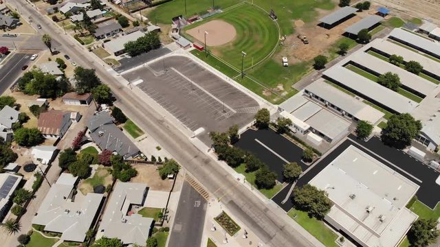 Small town baseball field near crops
