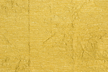 golden creased metallic foil background texture