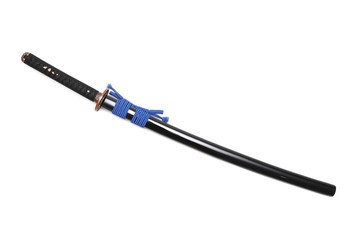 Blue Japanese sword and black scabbard with copper fitting isolated in white background.