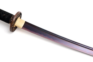 Naklejka premium Folded steel blade of Japanese sword (Chinese made) red color by titanium coated isolated in white background