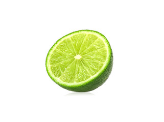 Fresh lemons cut in half on a white background.