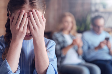 I dont want to see you. Sad depressed young girl closing her eyes and being upset while feeling...