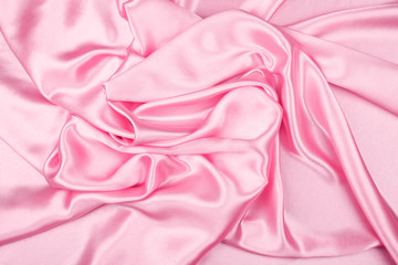 Pink luxury satin fabric texture for background