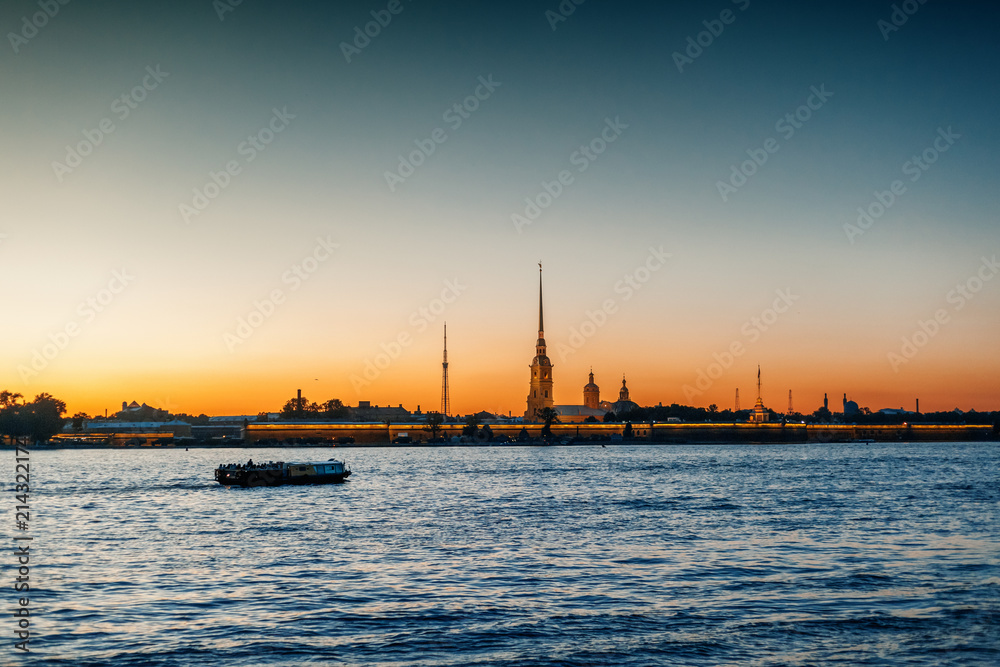 Wall mural Beautiful city night landscape, white nights in St. Petersburg, view of the Neva and Peter and Paul Fortress