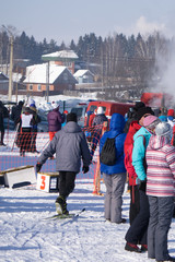 Mass race runners. Sports competitions among Amateurs and professionals. Running on snow in winter.