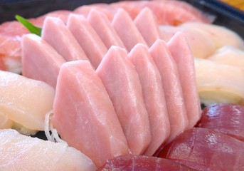 Japanese Sashimi with raw fish at restaurant