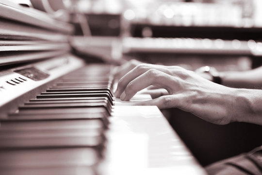 musician playing piano