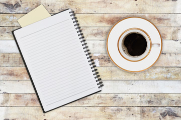 Obraz na płótnie Canvas notebook and cup of coffee