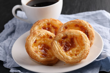 Pastel de nata and coffee