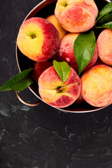 Ripe peaches in a bowl