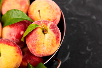 Ripe peaches in a bowl