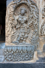 Sculpture of the Rati, Consort of Kamadeva, at the Eastern entrance of Chennakeshava temple, Belur, Karnataka.