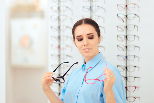 Girl Choosing Eyeglasses Frames in Optical Store