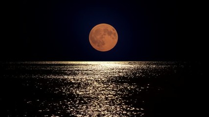 Full moon light reflect in sea water, summer romantic night at seaside