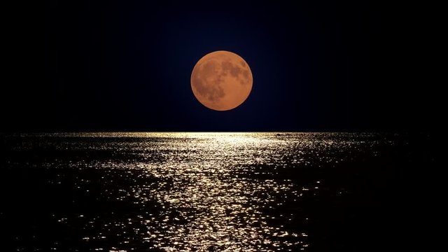 Full moon light reflect in sea water, summer romantic night at seaside