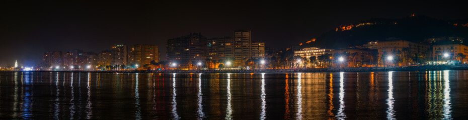 The Malagueta beach at night time in Malaga, Spain