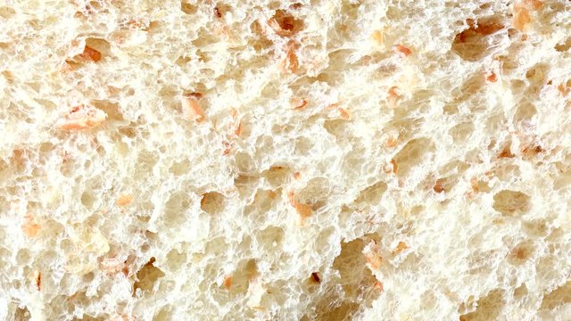 whole wheat bread texture. dolly shot, sliding camera move.