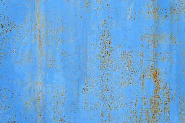 Blue rusty metal  background  with abstract texture. Old vintage scratches paint splats iron surface. Abstract background.