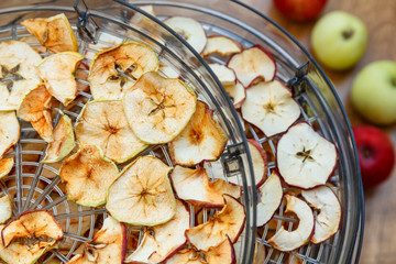 Fresh dryed apple chips prepared in a home