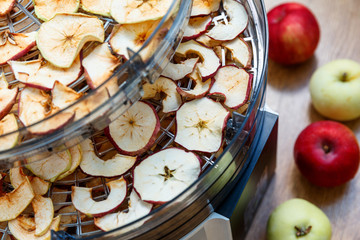 Fresh dryed apple chips prepared in a home