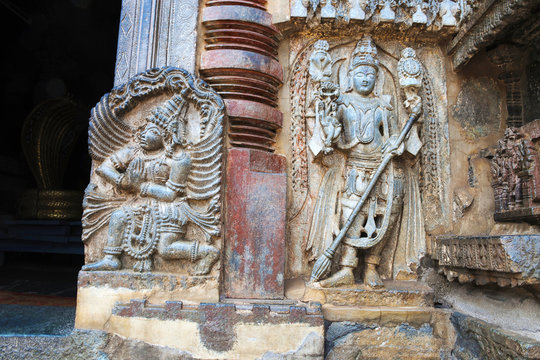 Close up of dwarapala and Garuda, on the right side of the South entrance, Chennakesava temple, Belur, Karnataka.