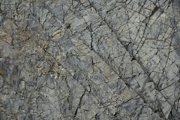 Rock textured surface background grey