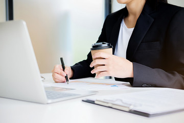 Administrator business man financial inspector and secretary making report calculating balance. Internal Revenue Service checking document. Audit concept