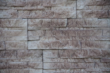 Background. Texture. Stone wall. Rocky background, patterned stone, brick background for wallpaper.