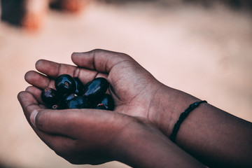 Man holding Berry