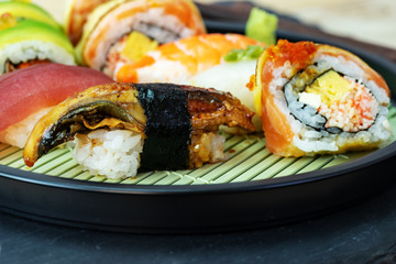 nigiri sushi set in bamboo dish