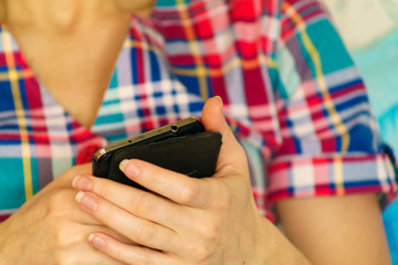 phone in woman's hands