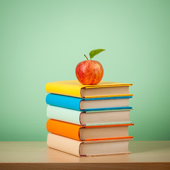 Education concept with books and apple